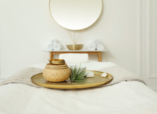 Beautiful spa composition on massage table in wellness center